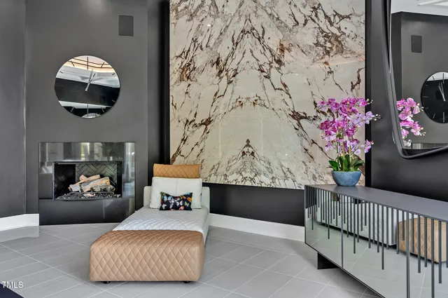 a living room with furniture a couch and a flat screen tv