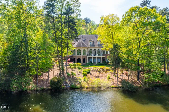 a view of a livingroom with furniture and a window