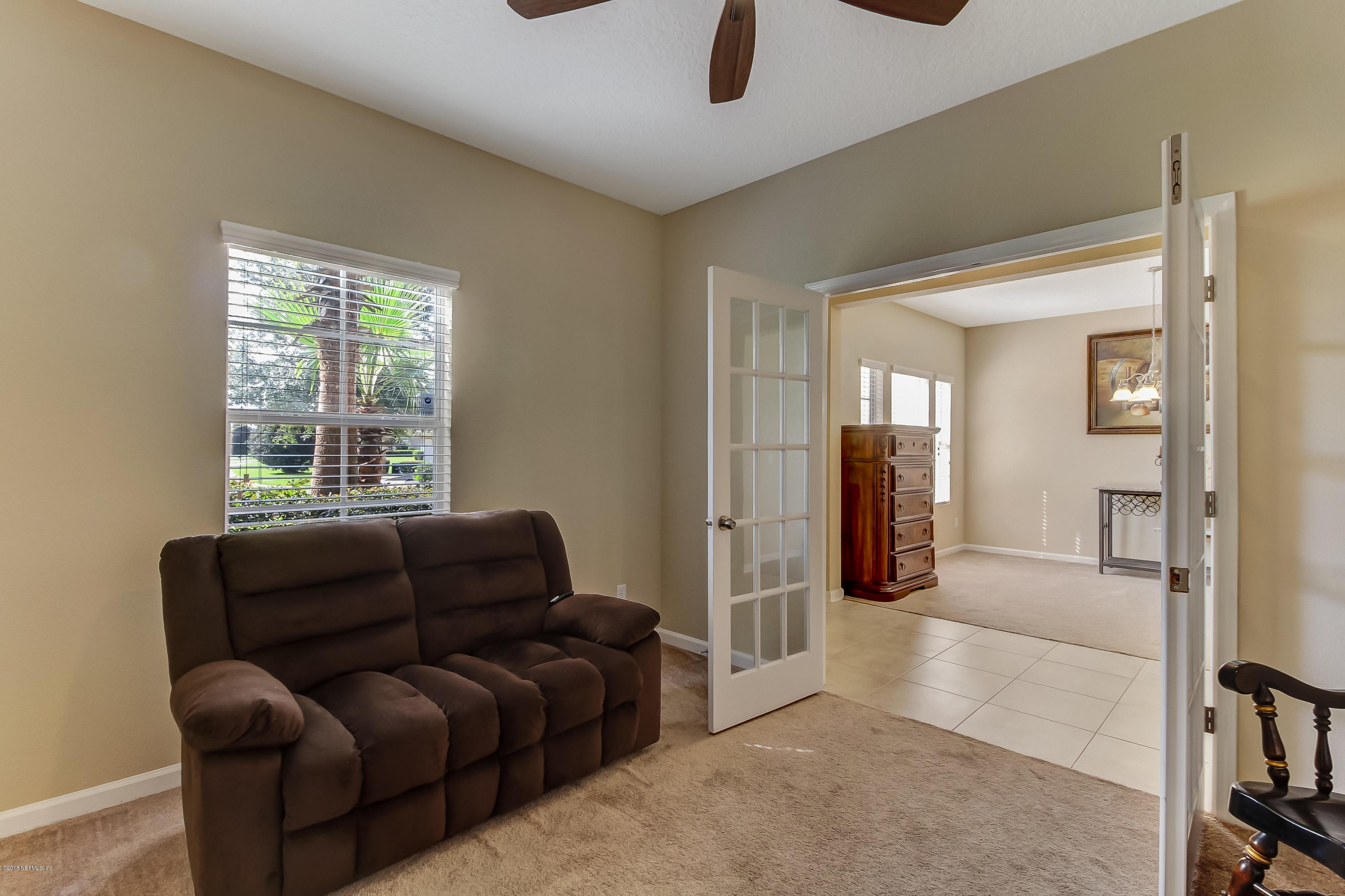 16480 Tisons Bluff Road Jacksonville, FL 32218 - Photo 14 of 80 a living room with furniture and a window