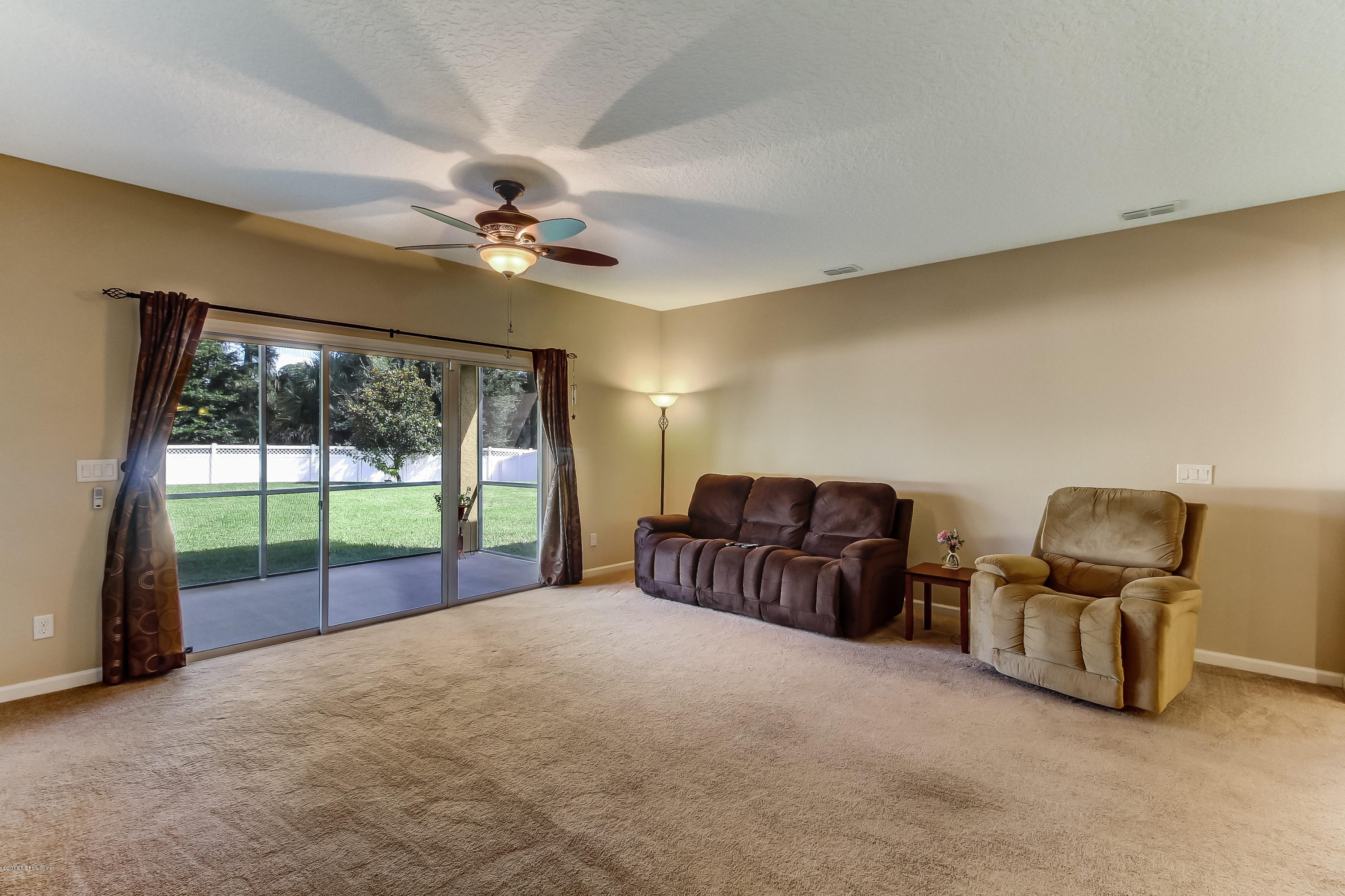 16480 Tisons Bluff Road Jacksonville, FL 32218 - Photo 23 of 80 a big room with windows and closet