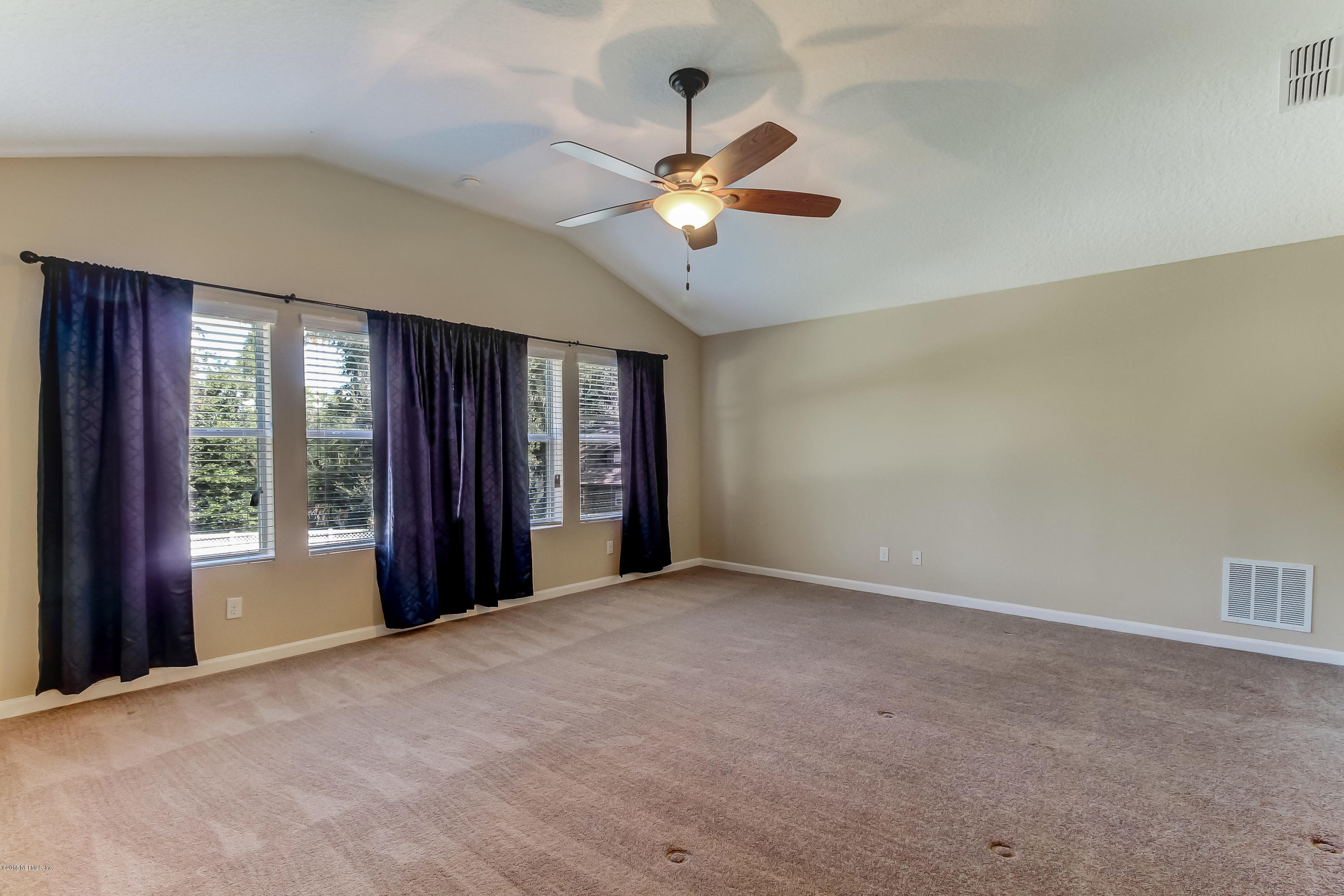 16480 Tisons Bluff Road Jacksonville, FL 32218 - Photo 45 of 80 a view of an empty room with a window