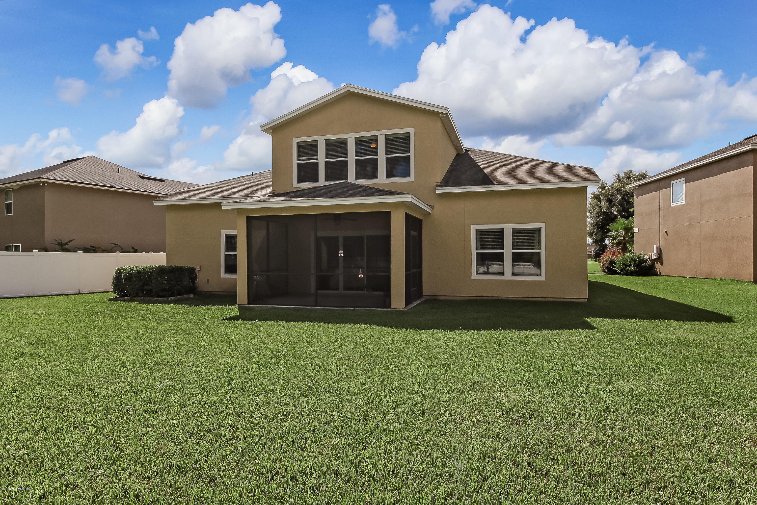 16480 Tisons Bluff Road Jacksonville, FL 32218 - Photo 56 of 80 a front view of a house with a garden