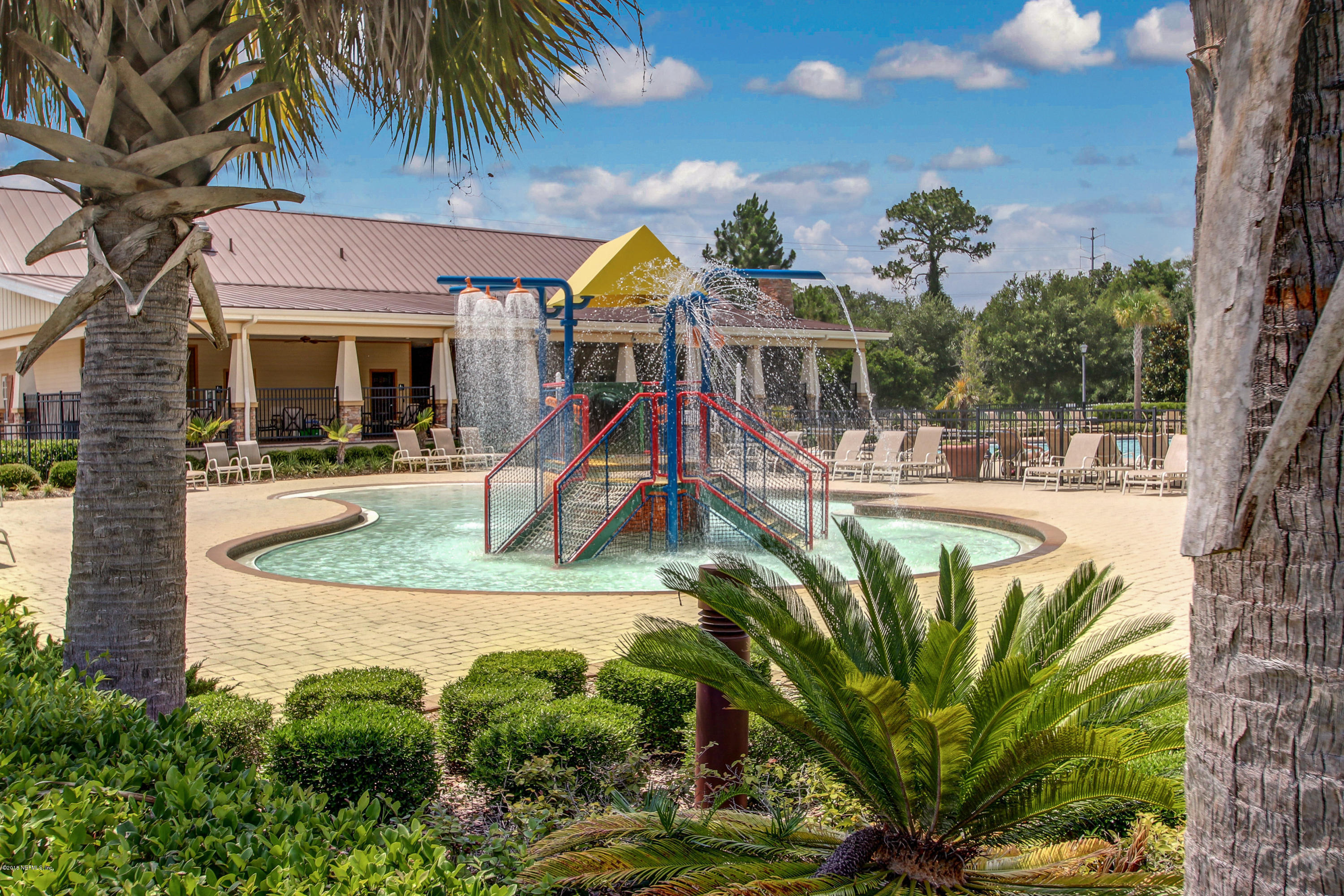 16480 Tisons Bluff Road Jacksonville, FL 32218 - Photo 66 of 80 a view of a house with swimming pool and sitting area