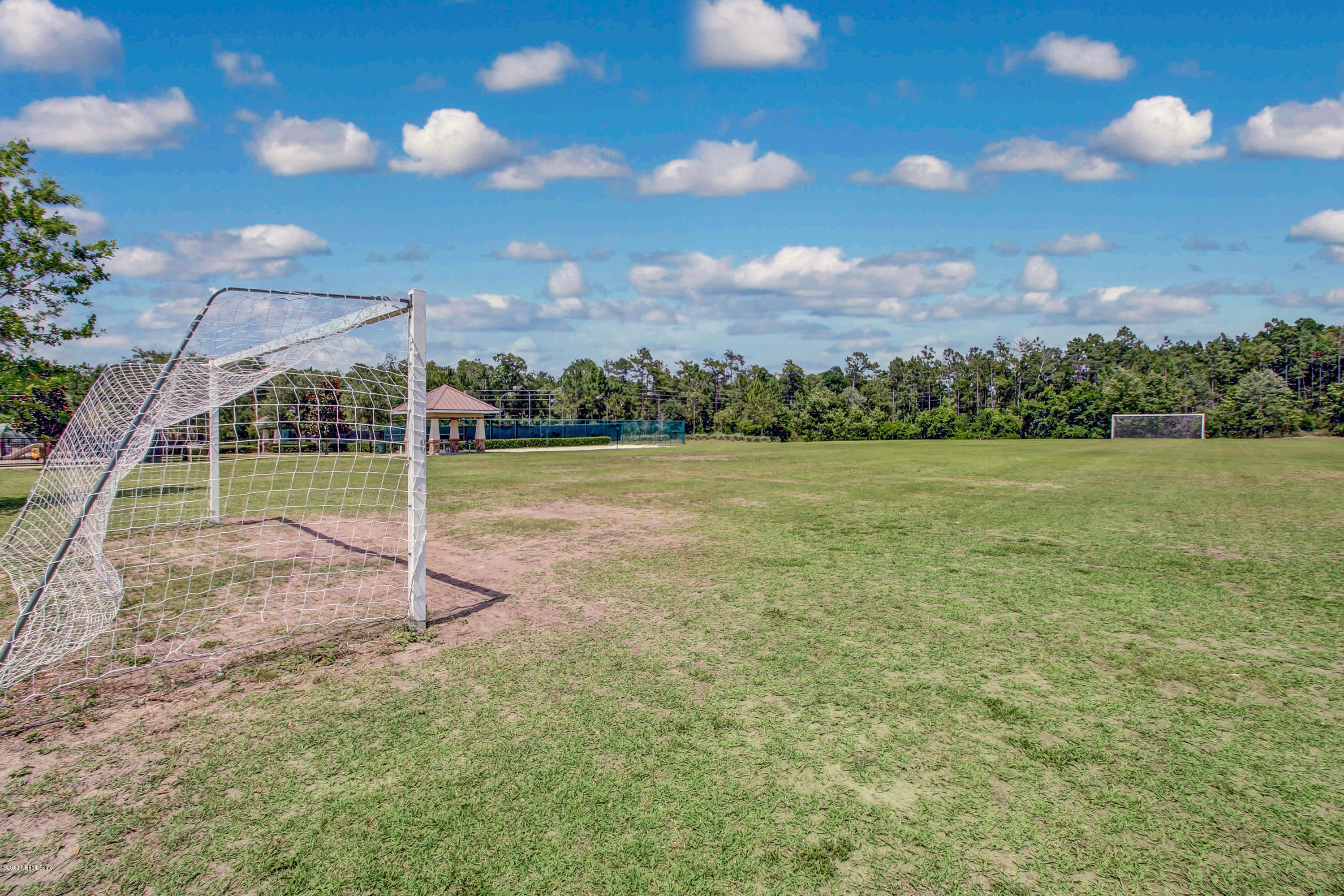 16480 Tisons Bluff Road Jacksonville, FL 32218 - Photo 77 of 80 a view of a field with sitting area