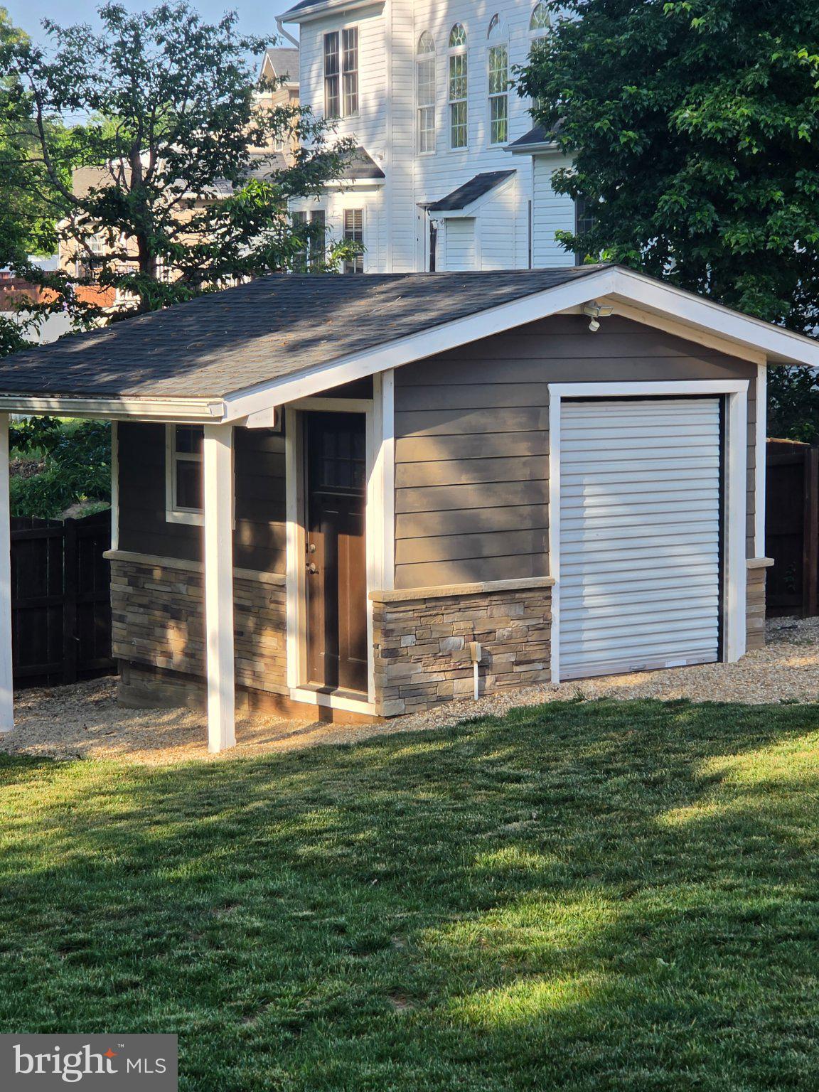 35175 Pheasant Ridge Road Locust Grove, VA 22508 - Photo 67 of 80 Charming garden shed with stone accents.