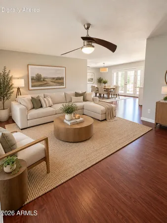 a living room with furniture and a table