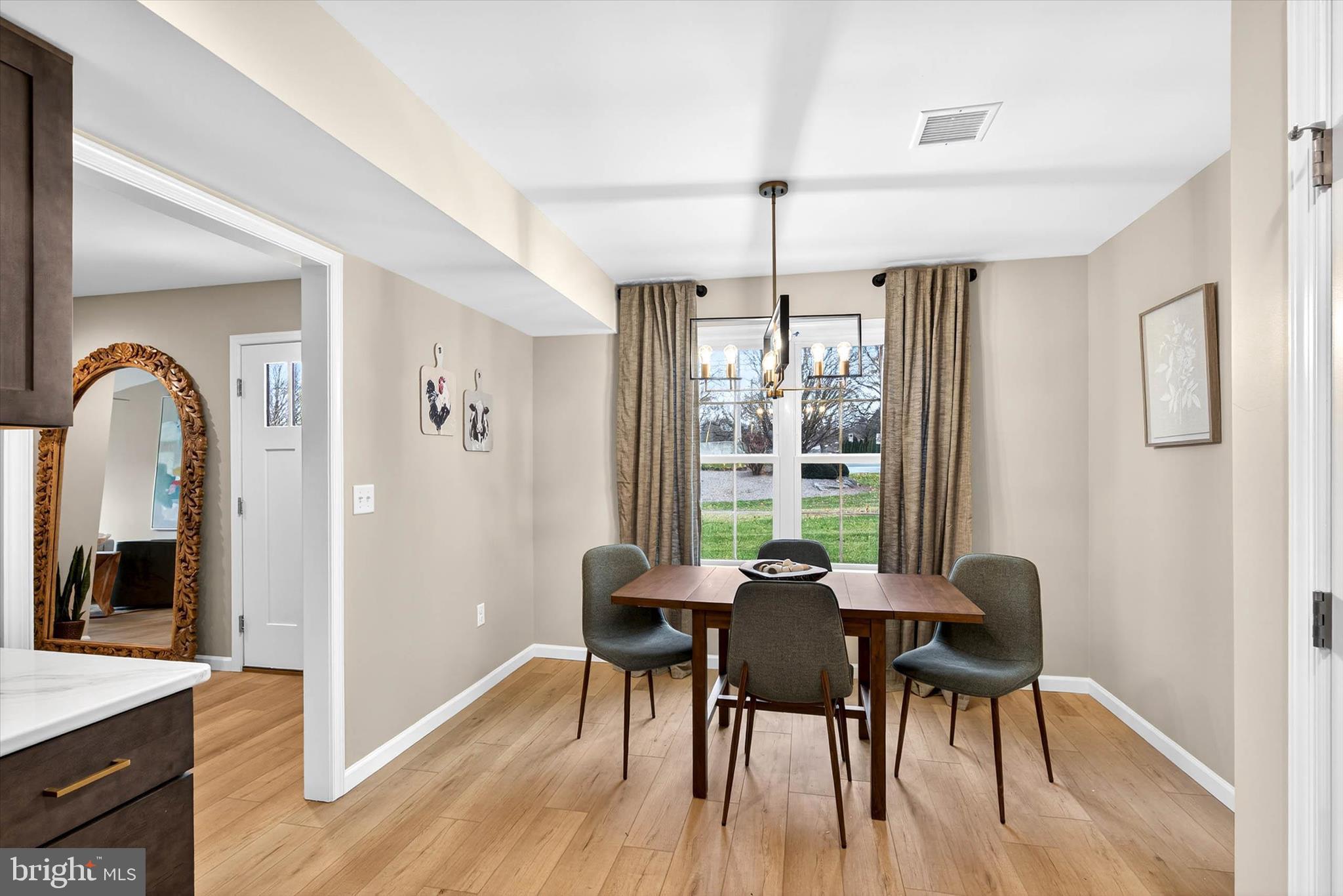 129 Hillard Field Lancaster, PA 17603 - Photo 17 of 41 a view of a dining room with furniture window and wooden floor