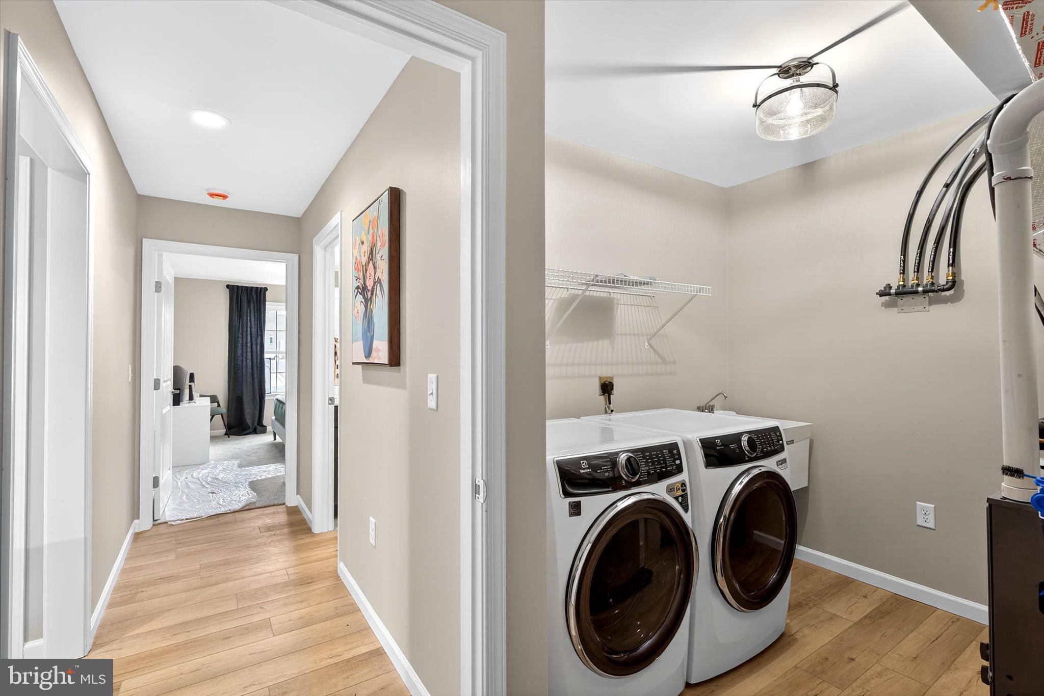 129 Hillard Field Lancaster, PA 17603 - Photo 28 of 41 a view of a hallway with washer and dryer