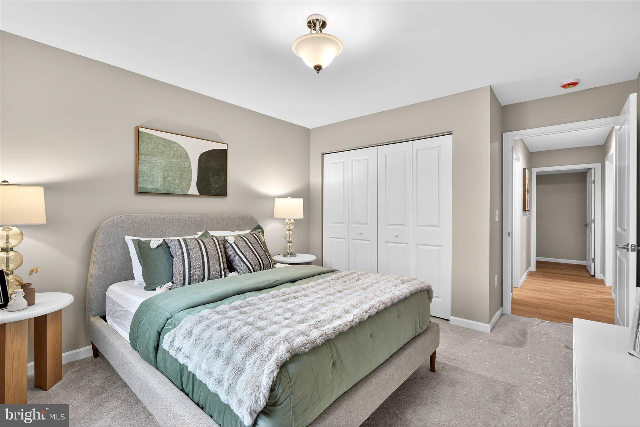 129 Hillard Field Lancaster, PA 17603 - Photo 32 of 41 a bedroom with a bed and a lamp