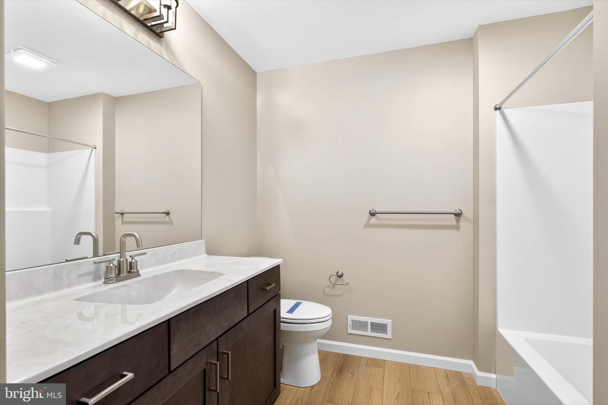 129 Hillard Field Lancaster, PA 17603 - Photo 36 of 41 a bathroom with a granite countertop sink toilet a large mirror and shower