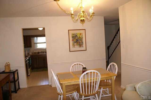 5454 Pine Top Circle Raleigh, NC 27612 - Photo 5 of 10 a view of a dining room with furniture