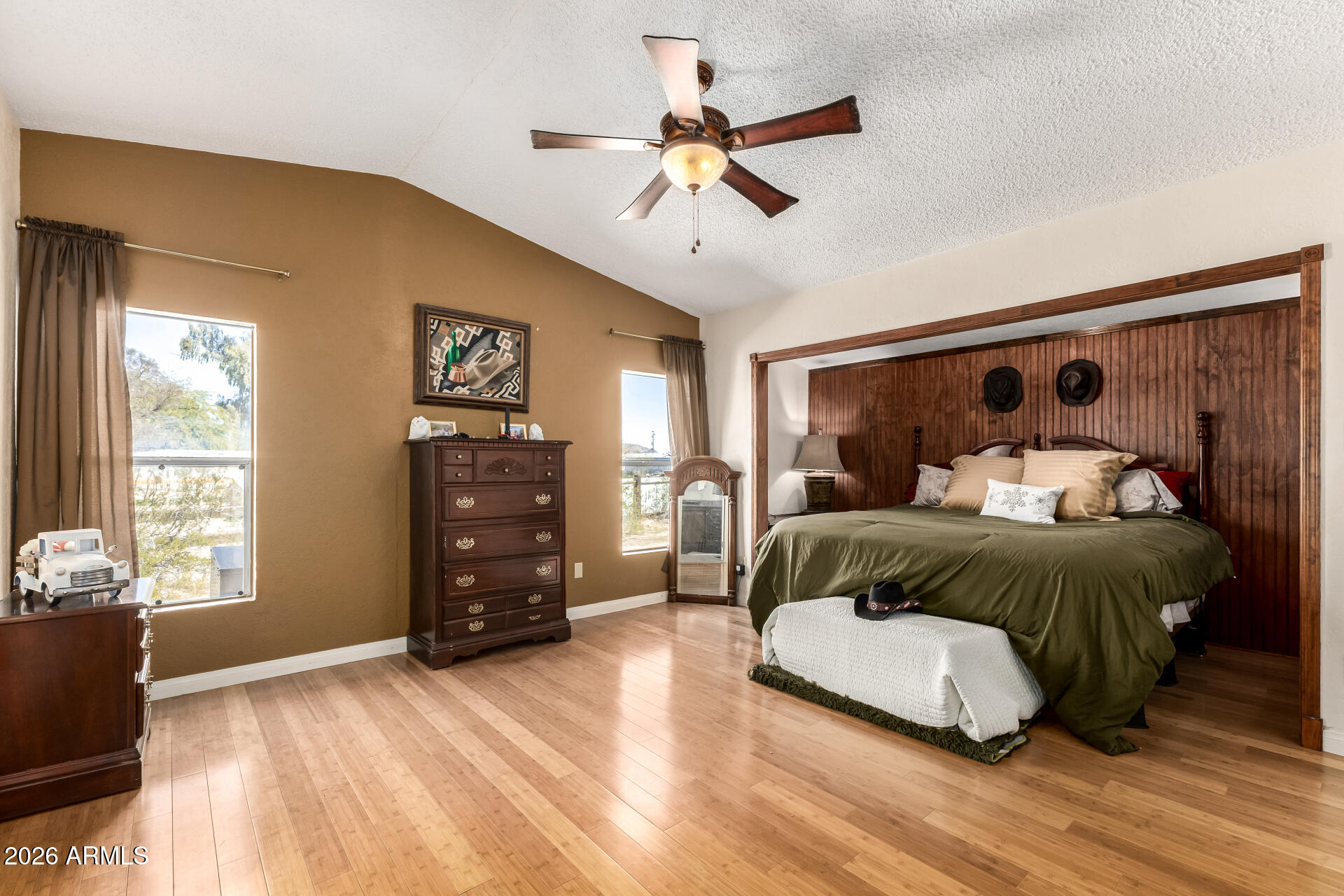 9987 North Geronimo Drive Casa Grande, AZ 85122 - Photo 20 of 53 a bedroom with a bed and wooden floor