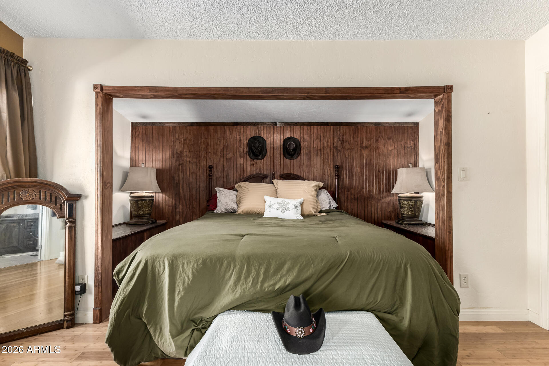 9987 North Geronimo Drive Casa Grande, AZ 85122 - Photo 23 of 53 a bedroom with a bed and a mirror