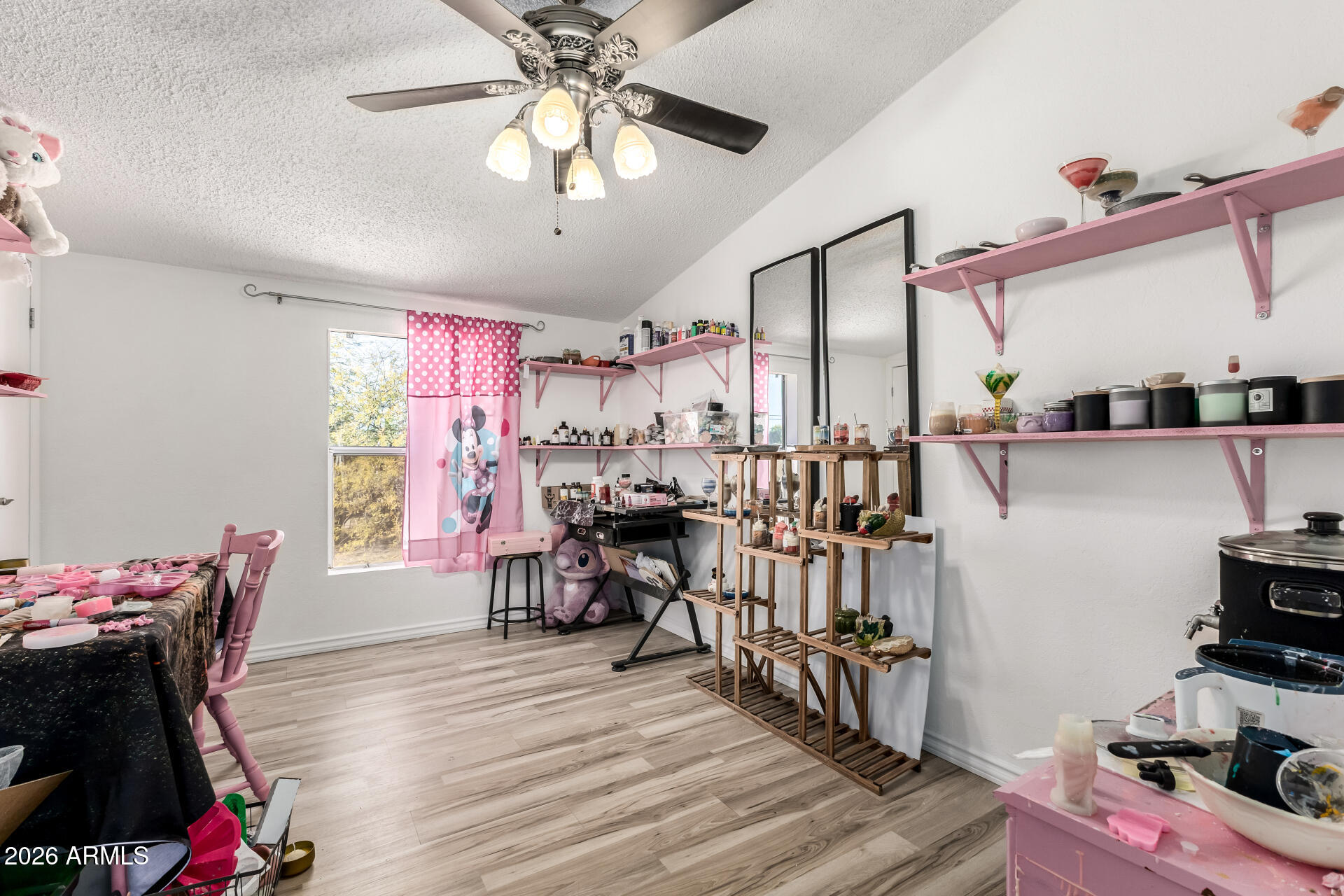 9987 North Geronimo Drive Casa Grande, AZ 85122 - Photo 31 of 53 a view of a dining room with furniture and wooden floor