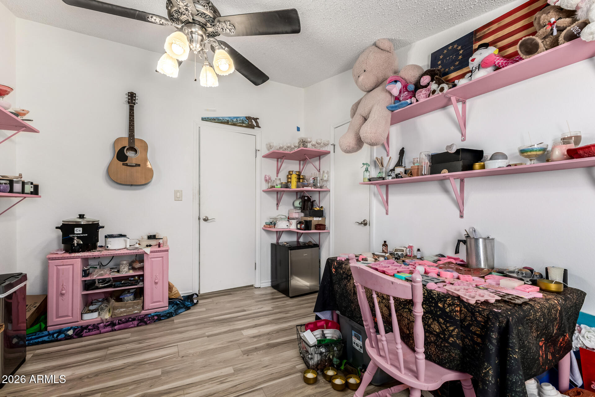 9987 North Geronimo Drive Casa Grande, AZ 85122 - Photo 32 of 53 a room with storage and utility racks