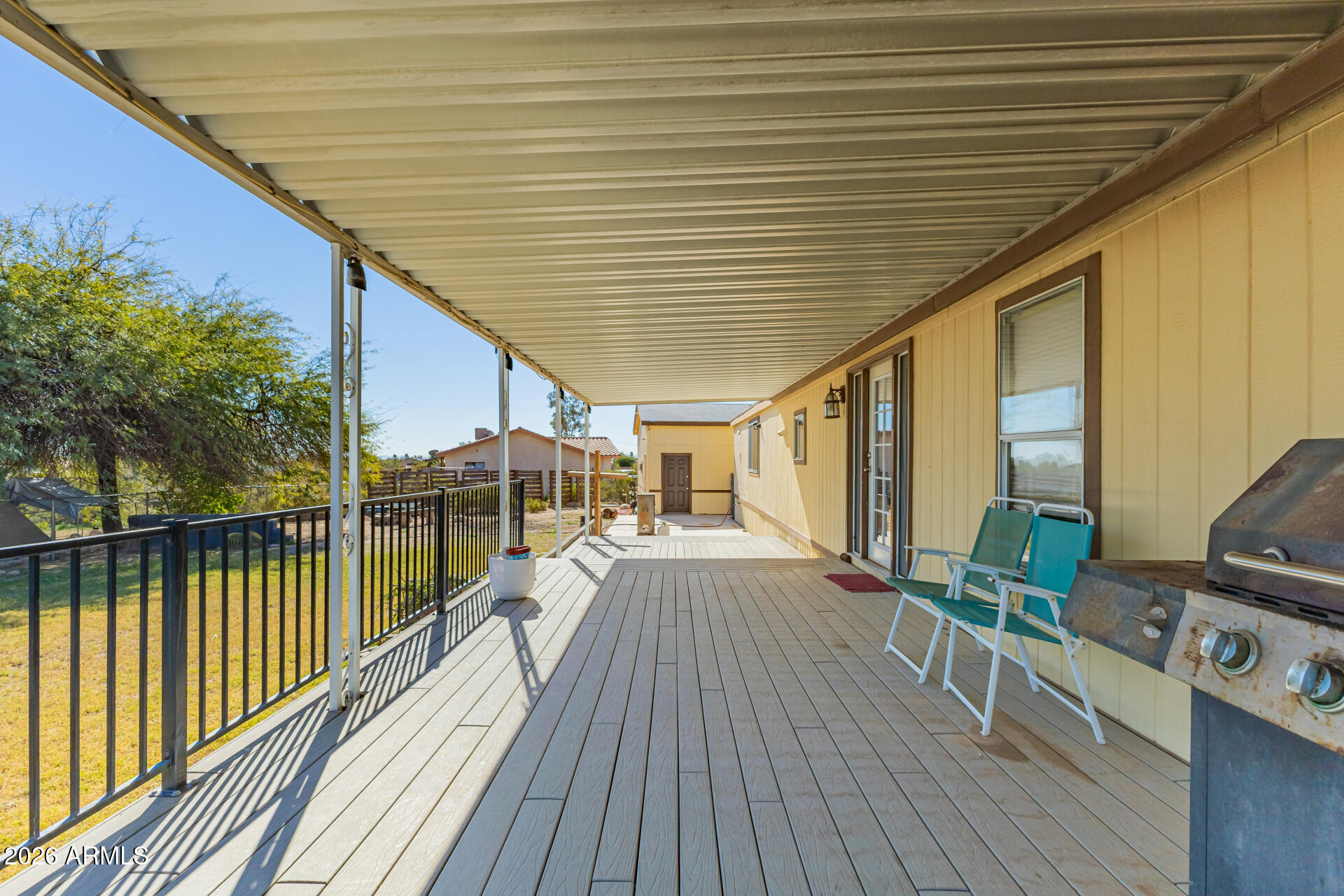 9987 North Geronimo Drive Casa Grande, AZ 85122 - Photo 37 of 53 a view of a balcony with wooden floor