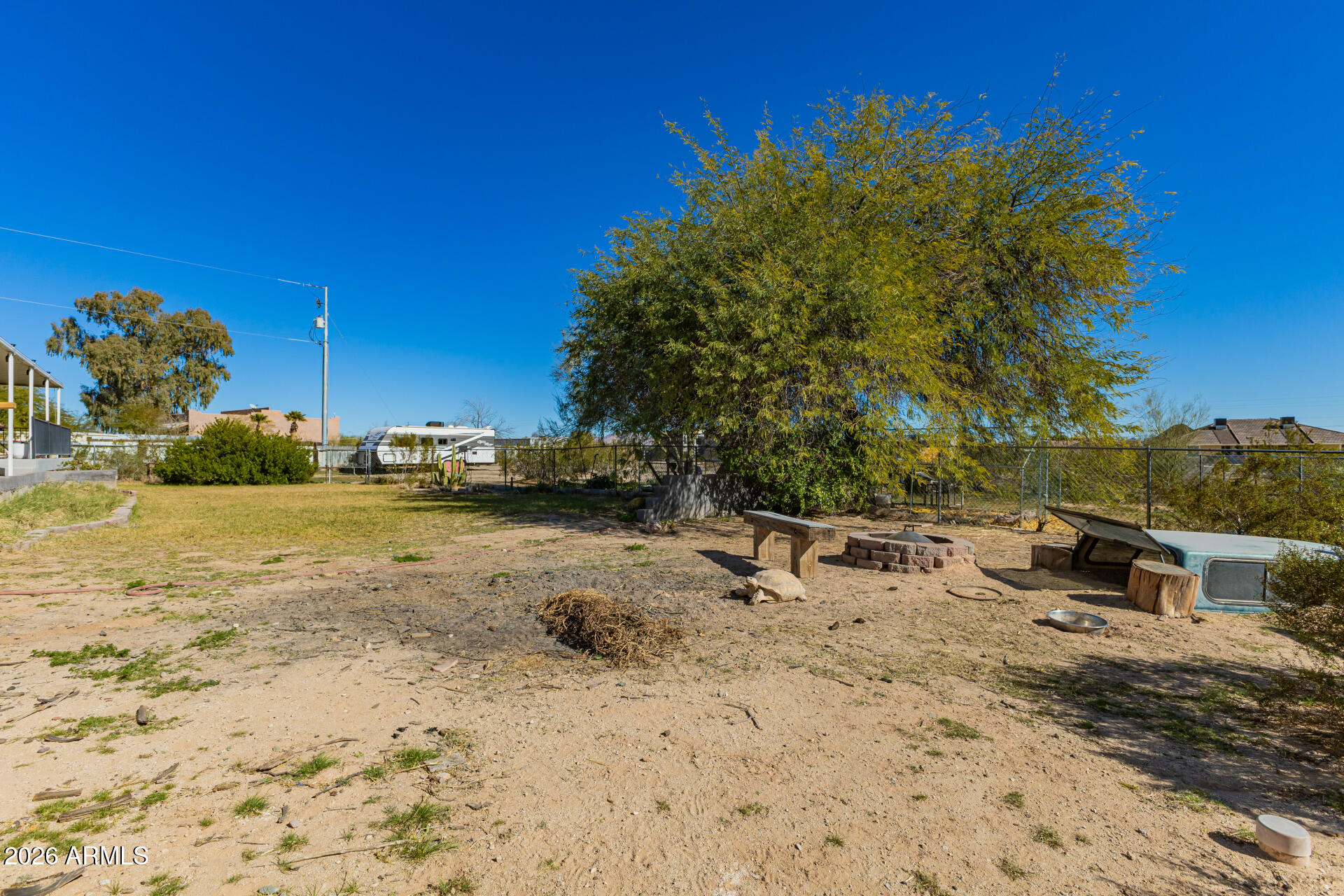 9987 North Geronimo Drive Casa Grande, AZ 85122 - Photo 42 of 53 a view of a backyard with a table and chairs
