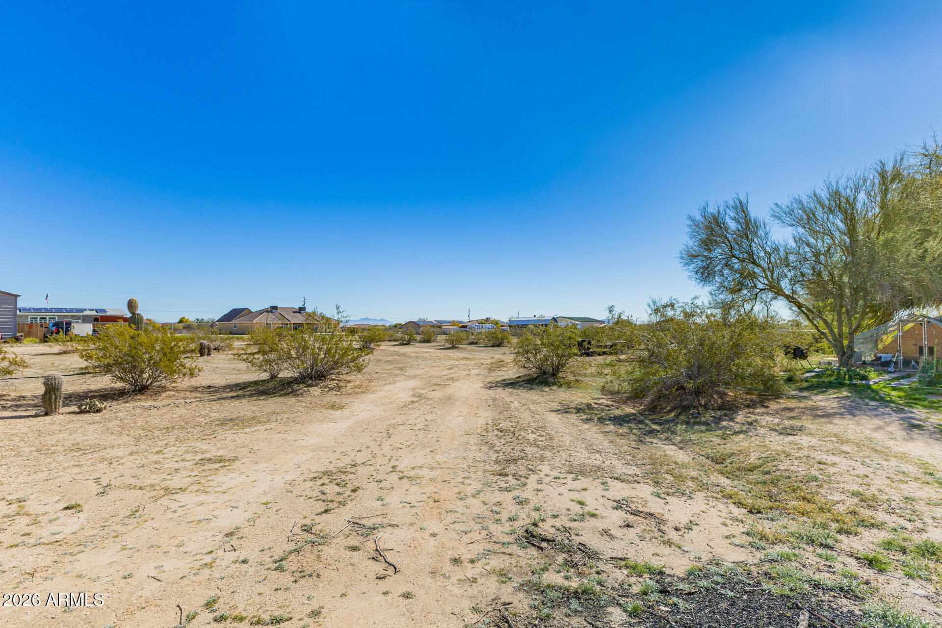 9987 North Geronimo Drive Casa Grande, AZ 85122 - Photo 48 of 53 a view of a dry yard with mountains in the background