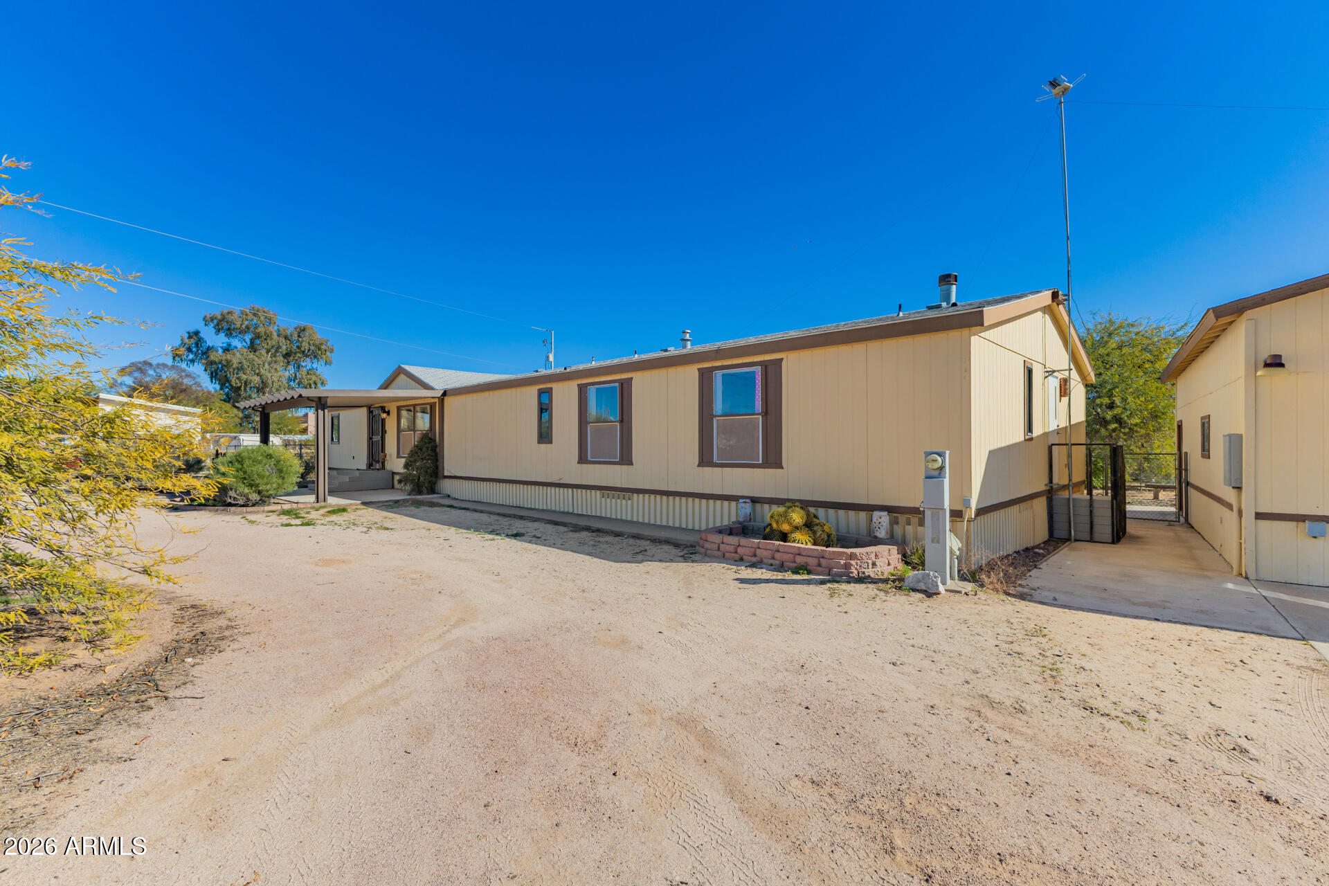 9987 North Geronimo Drive Casa Grande, AZ 85122 - Photo 7 of 53 a view of a house with a snow in the background