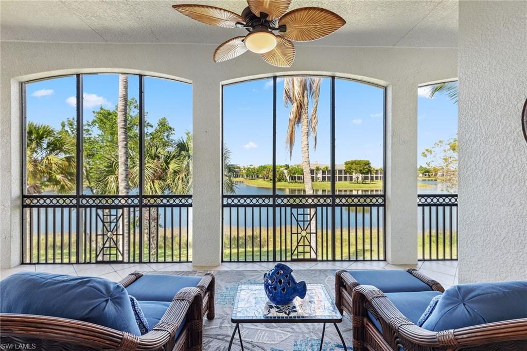 9259 Museo Circle, Unit 201 Naples, FL 34114 - Photo 26 of 50 a bed room with furniture and a window