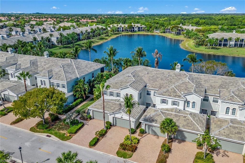 9259 Museo Circle, Unit 201 Naples, FL 34114 - Photo 31 of 50 an aerial view of house with yard space and ocean view