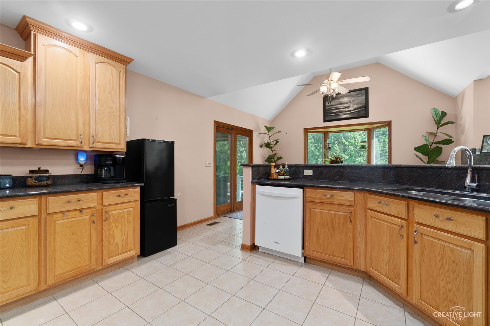 3684 East 2619 Th Road Sheridan, IL 60551 - Photo 11 of 32 a kitchen with granite countertop white cabinets and stainless steel appliances