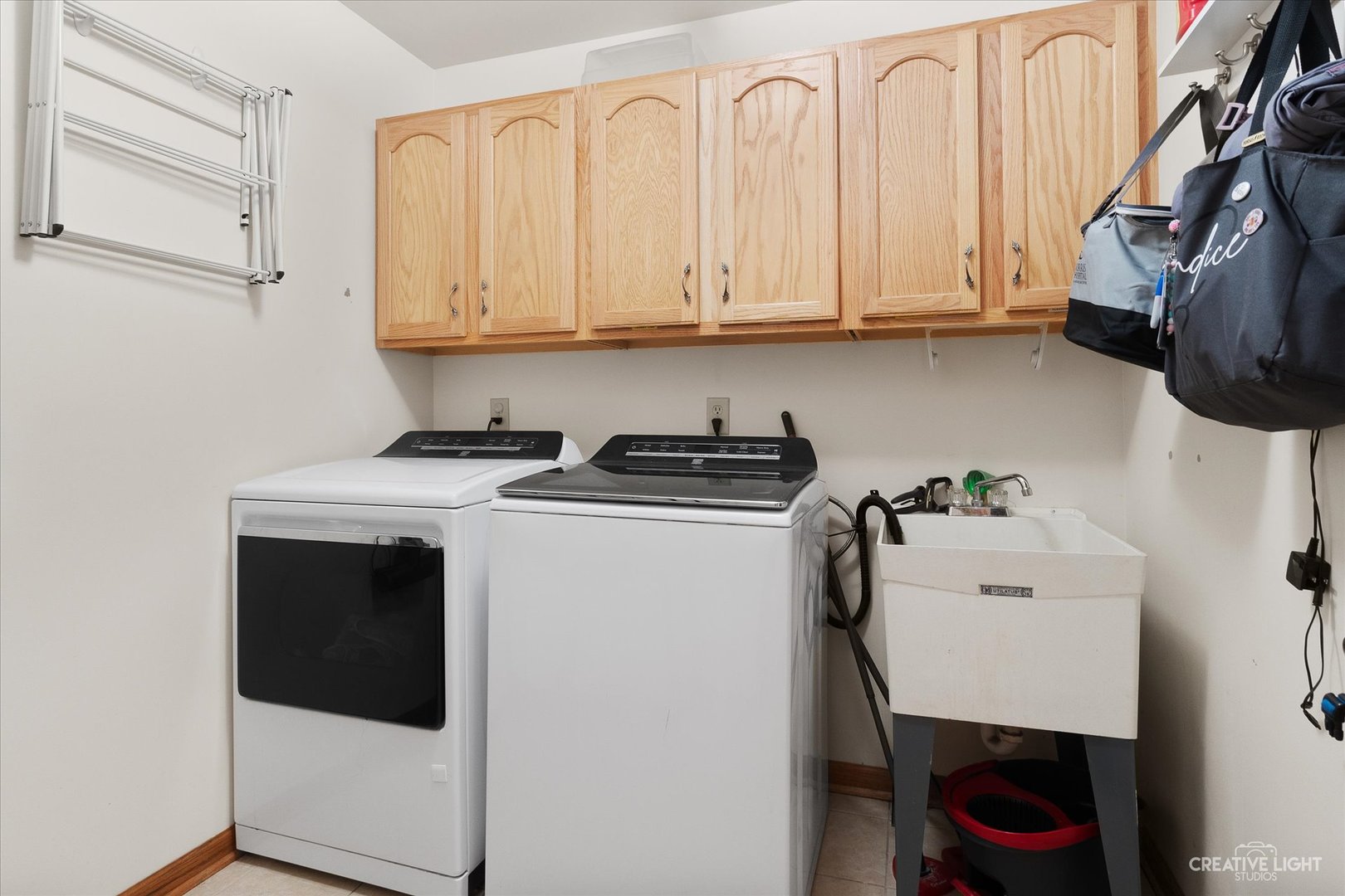 3684 East 2619 Th Road Sheridan, IL 60551 - Photo 13 of 32 a utility room with sink dryer and washer