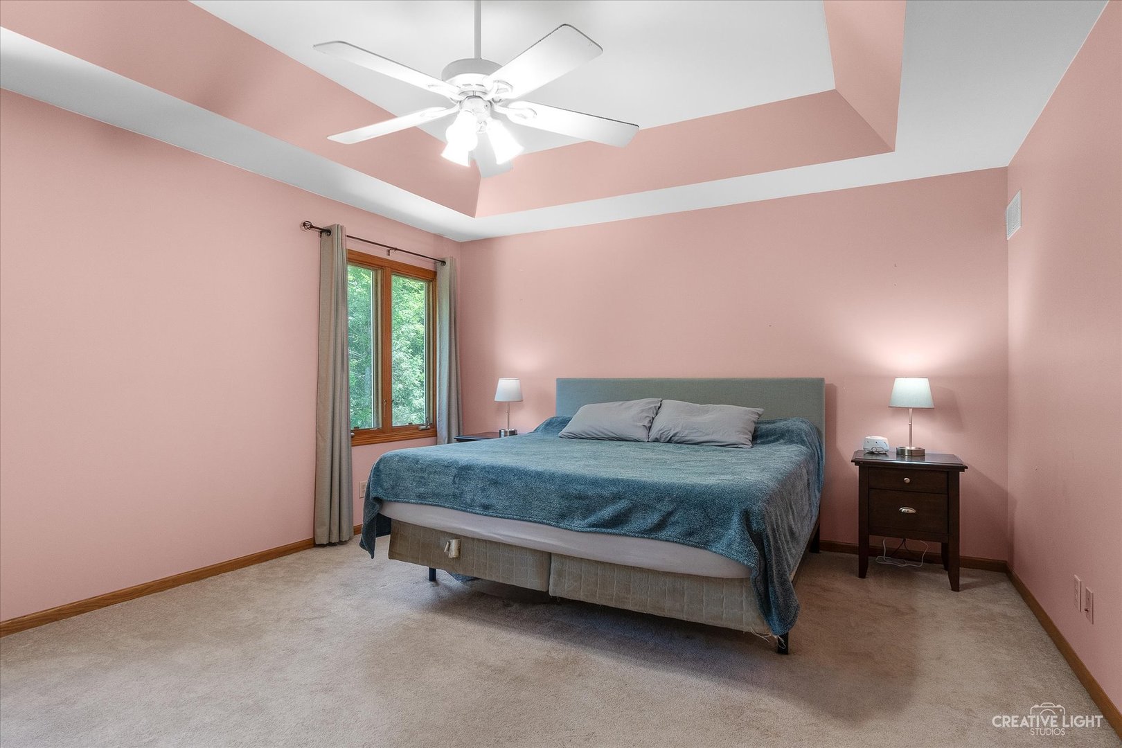 3684 East 2619 Th Road Sheridan, IL 60551 - Photo 14 of 32 a spacious bedroom with a bed a chandelier and a large window