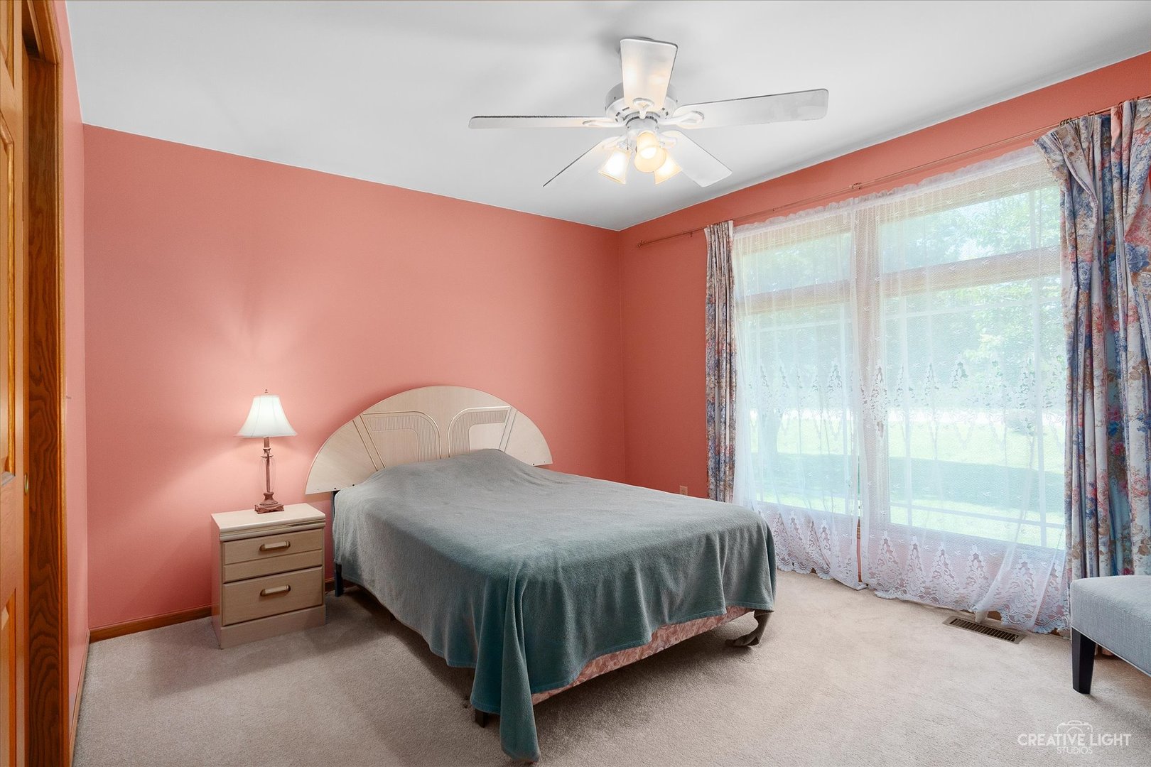 3684 East 2619 Th Road Sheridan, IL 60551 - Photo 17 of 32 a spacious bedroom with a bed and a chandelier