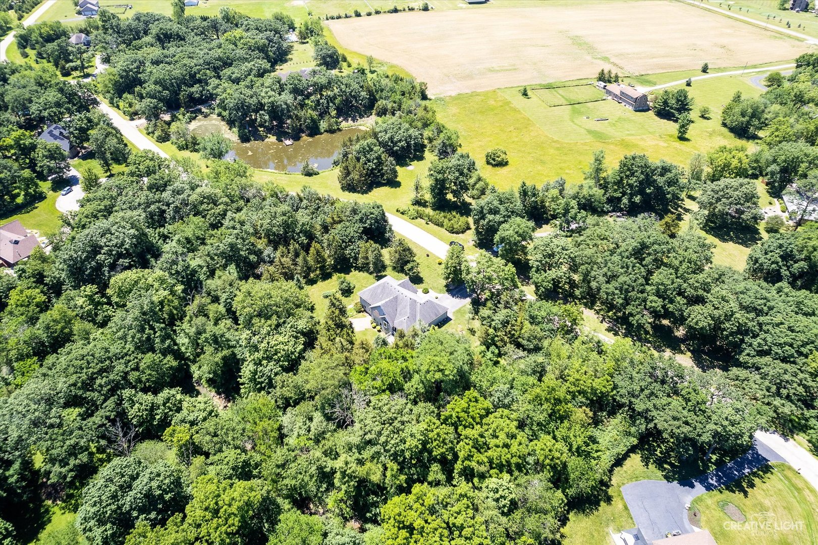 3684 East 2619 Th Road Sheridan, IL 60551 - Photo 29 of 32 an aerial view of residential house with outdoor space and trees all around
