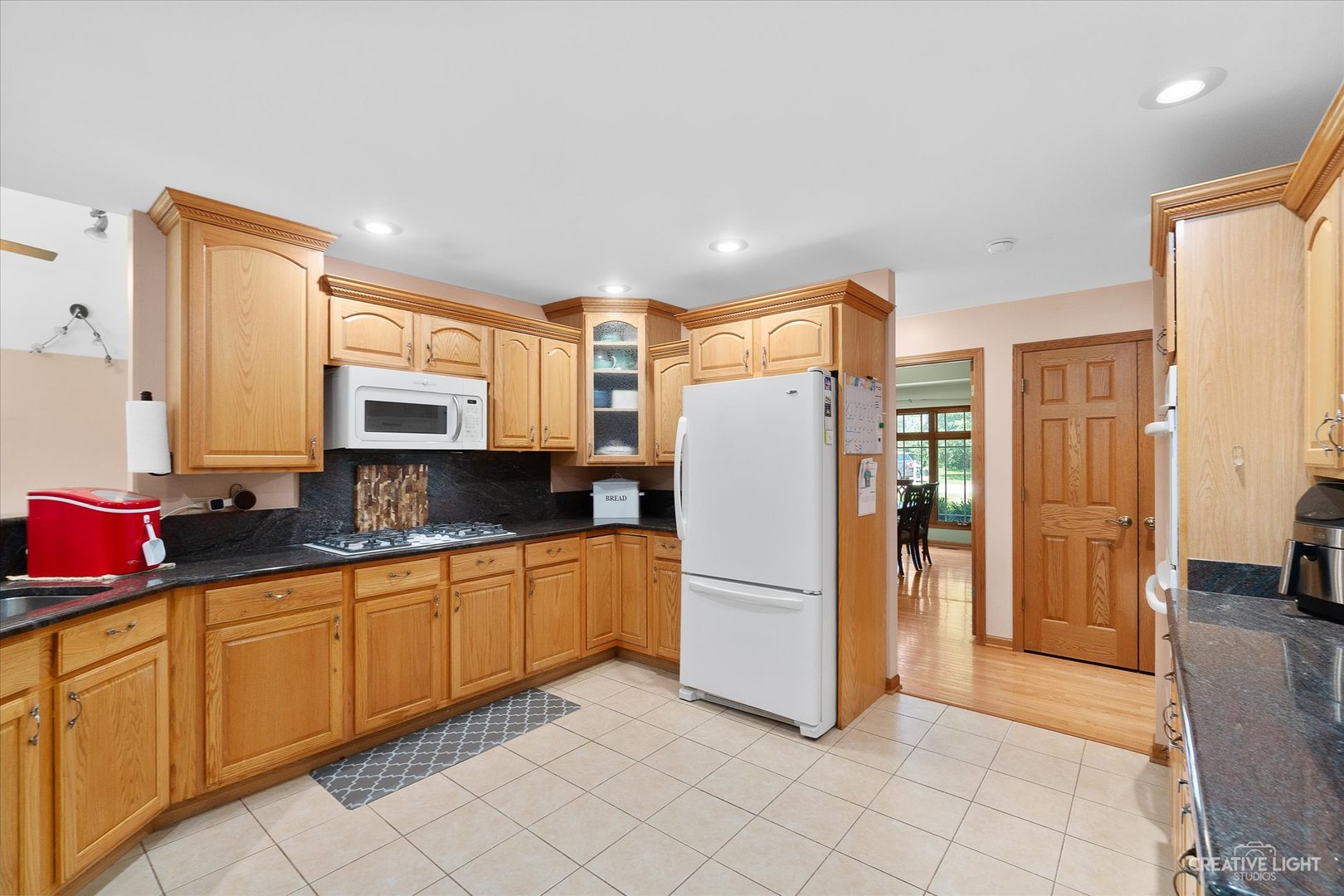 3684 East 2619 Th Road Sheridan, IL 60551 - Photo 10 of 32 a kitchen with sink cabinets and refrigerator