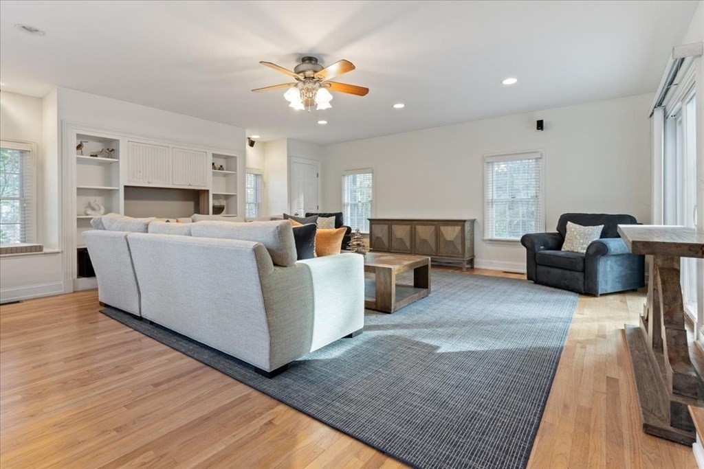 294 County Road Hanson, MA 02341 - Photo 15 of 38 a living room with furniture and a chandelier