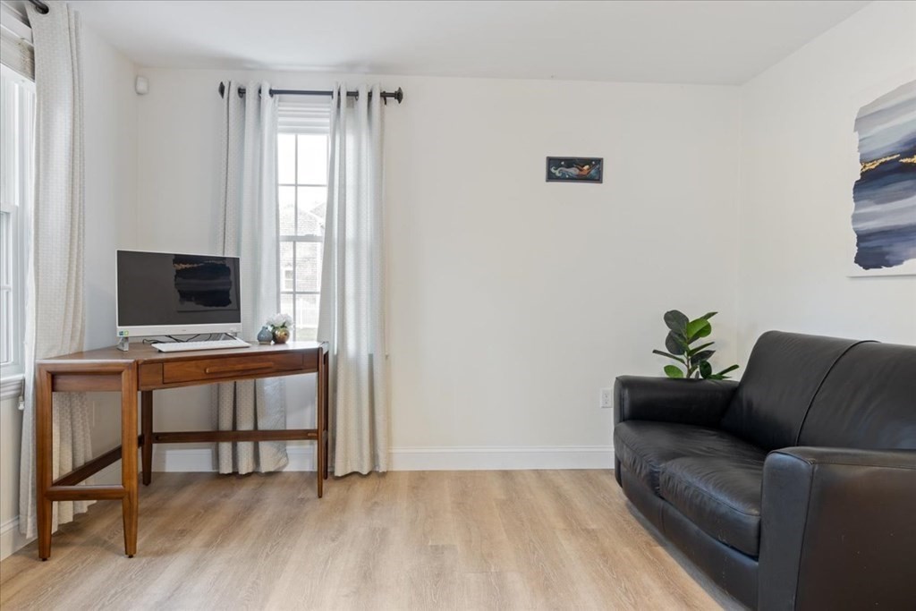 294 County Road Hanson, MA 02341 - Photo 17 of 38 a living room with furniture and a flat screen tv