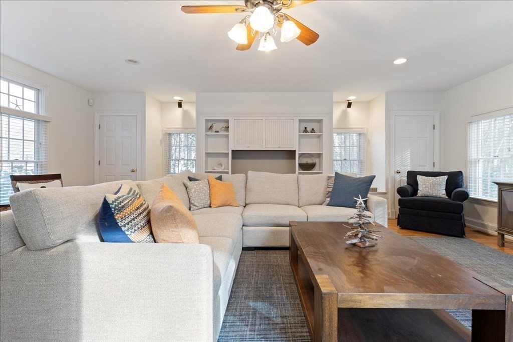 294 County Road Hanson, MA 02341 - Photo 19 of 38 a living room with furniture and a chandelier