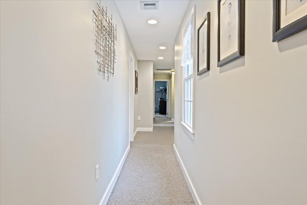 294 County Road Hanson, MA 02341 - Photo 28 of 38 a view of a hallway with wooden floor and entryway