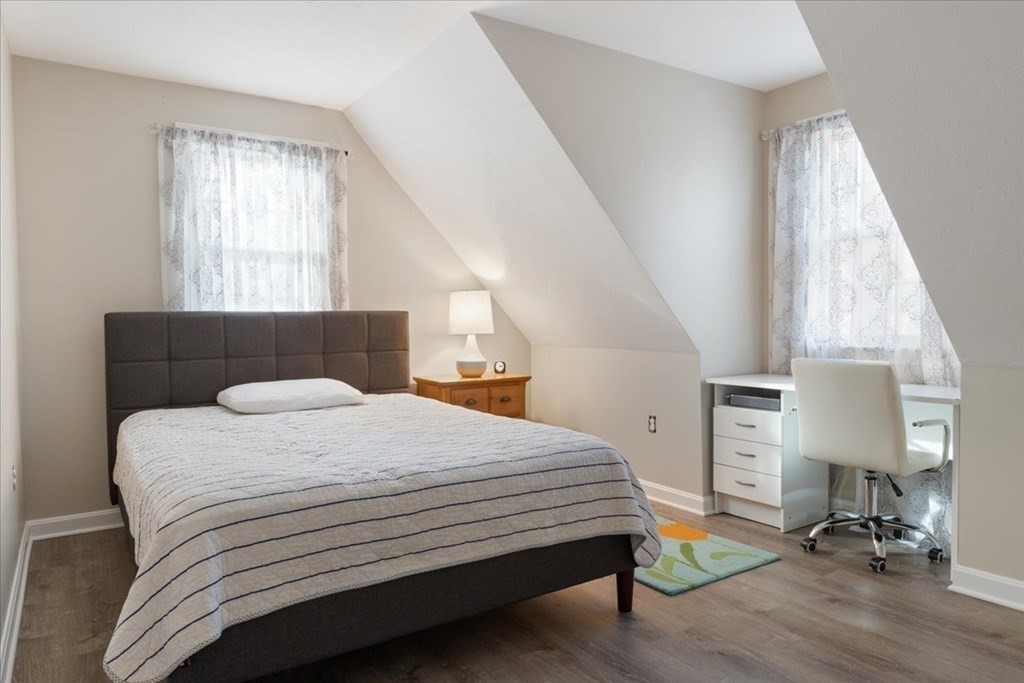 294 County Road Hanson, MA 02341 - Photo 29 of 38 a bedroom with a bed a table and chair