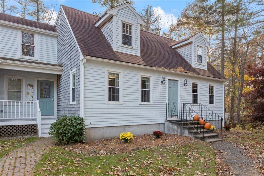 294 County Road Hanson, MA 02341 - Photo 3 of 38 a view of a house with a yard and a garden