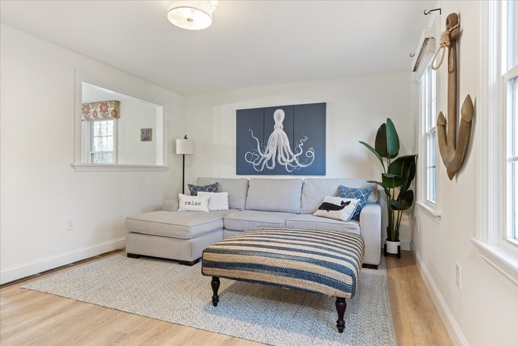 294 County Road Hanson, MA 02341 - Photo 5 of 38 a bedroom with a bed and a painting on the wall