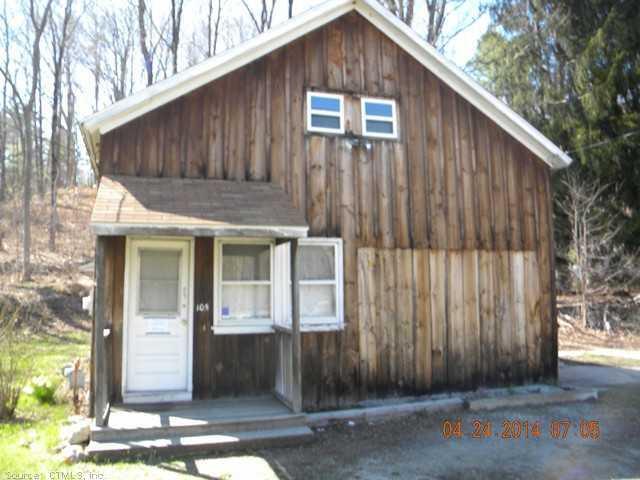105 Colebrook River Road Winchester, CT 06098 - Photo 1 of 1 a side view of a house