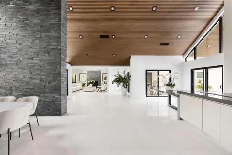 a lobby with furniture and windows