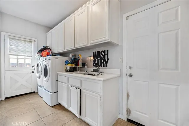 a bathroom with a sink vanity mirror and toilet