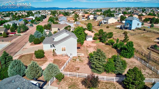 12510 Motley Road Peyton, CO 80831 - Photo 33 of 36 Drone / aerial view with a mountain view