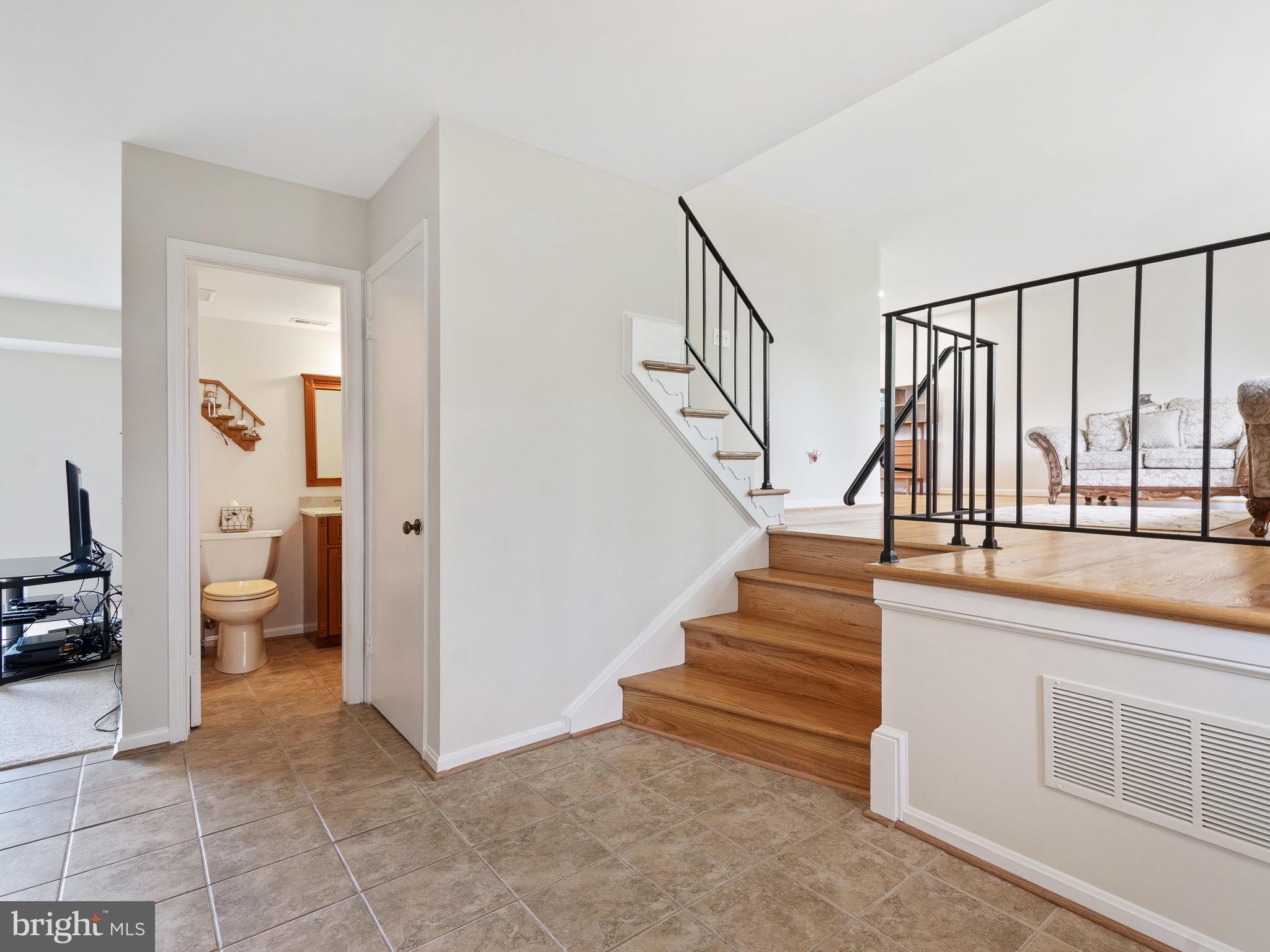 19228 Treadway Road Brookeville, MD 20833 - Photo 4 of 40 Foyer with beautiful and neutral floor tiles