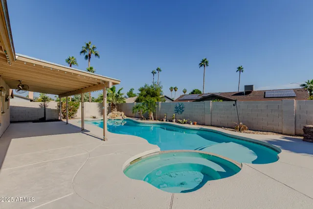 a view of a backyard with porch