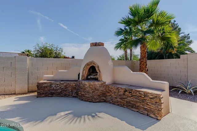 a house view with a backyard space