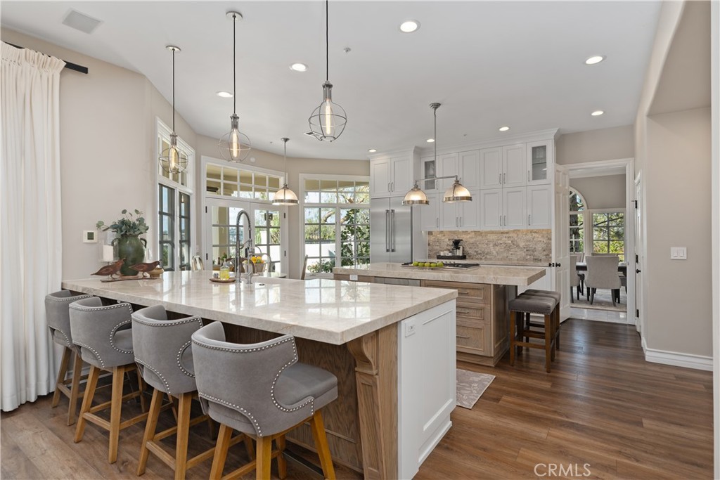 27971 Golden Ridge Lane San Juan Capistrano, CA 92675 - Photo 12 of 65 Remodeled Kitchen in white cabinetry and french oak wood