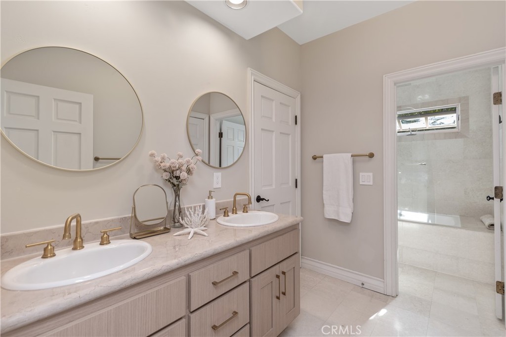 27971 Golden Ridge Lane San Juan Capistrano, CA 92675 - Photo 48 of 65 Jack and Jill Bathroom for Bedroom 2 and 3.