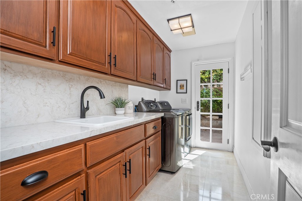 27971 Golden Ridge Lane San Juan Capistrano, CA 92675 - Photo 52 of 65 Remodeled with new countertops in quartz and a laundry shoot!