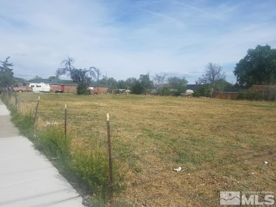 0 East 11th Street Reno, NV 89512 - Photo 5 of 7 a view of a lake with houses in the back