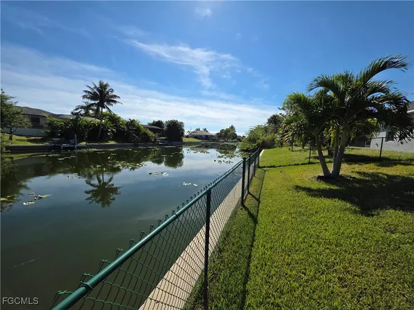 a view of a lake in a balcony with outdoor space